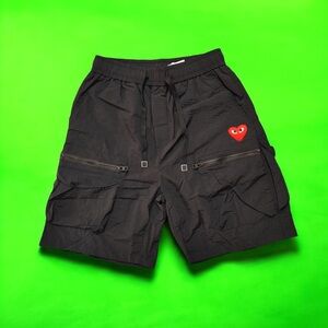 Comme des Garcons Black Shorts with Red Heart Patch